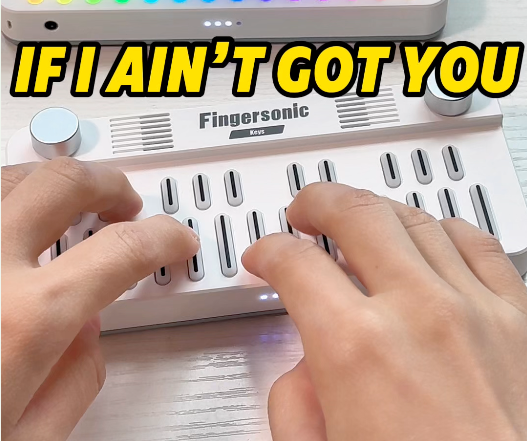 Two Fingersonic Keys used in a piano-style performance of If I Ain’t Got You with hands playing melody and harmony